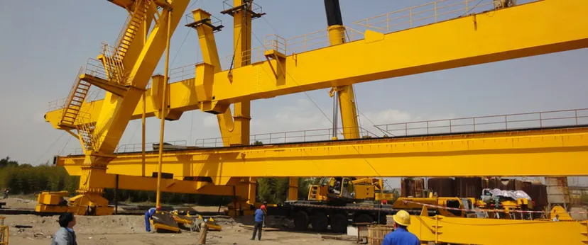 Gantry crane being erected on a customer site by an installation team